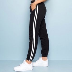 brandy melville rosa black sweats w/ white stripes